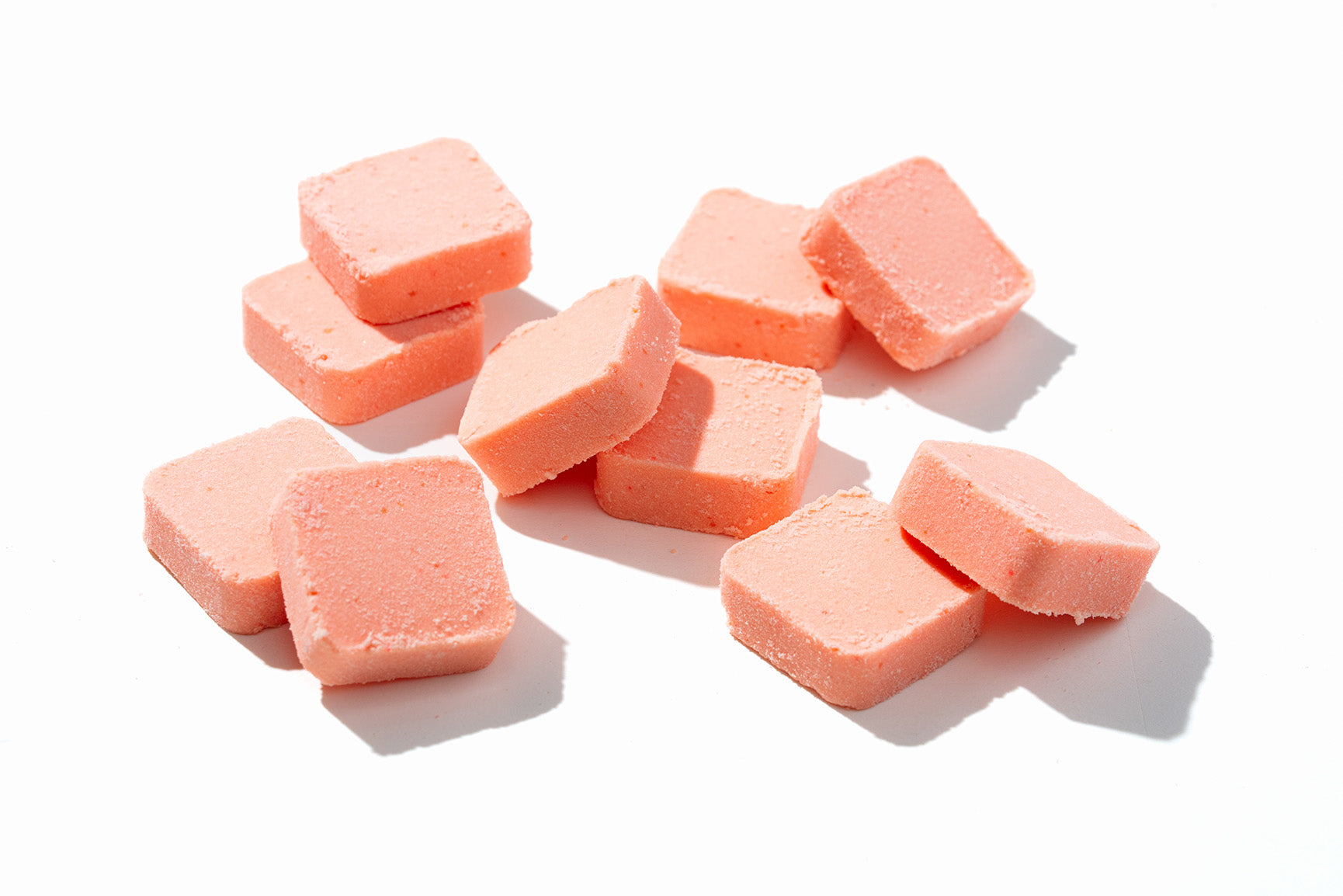 Group shot of scattered grapefruit garden shower steamers.
