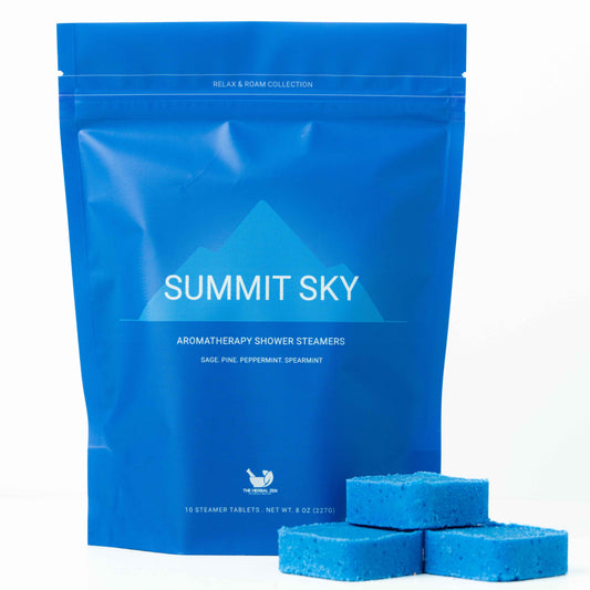 Blue packaging of Summit Sky aromatherapy shower steamers on a white background
